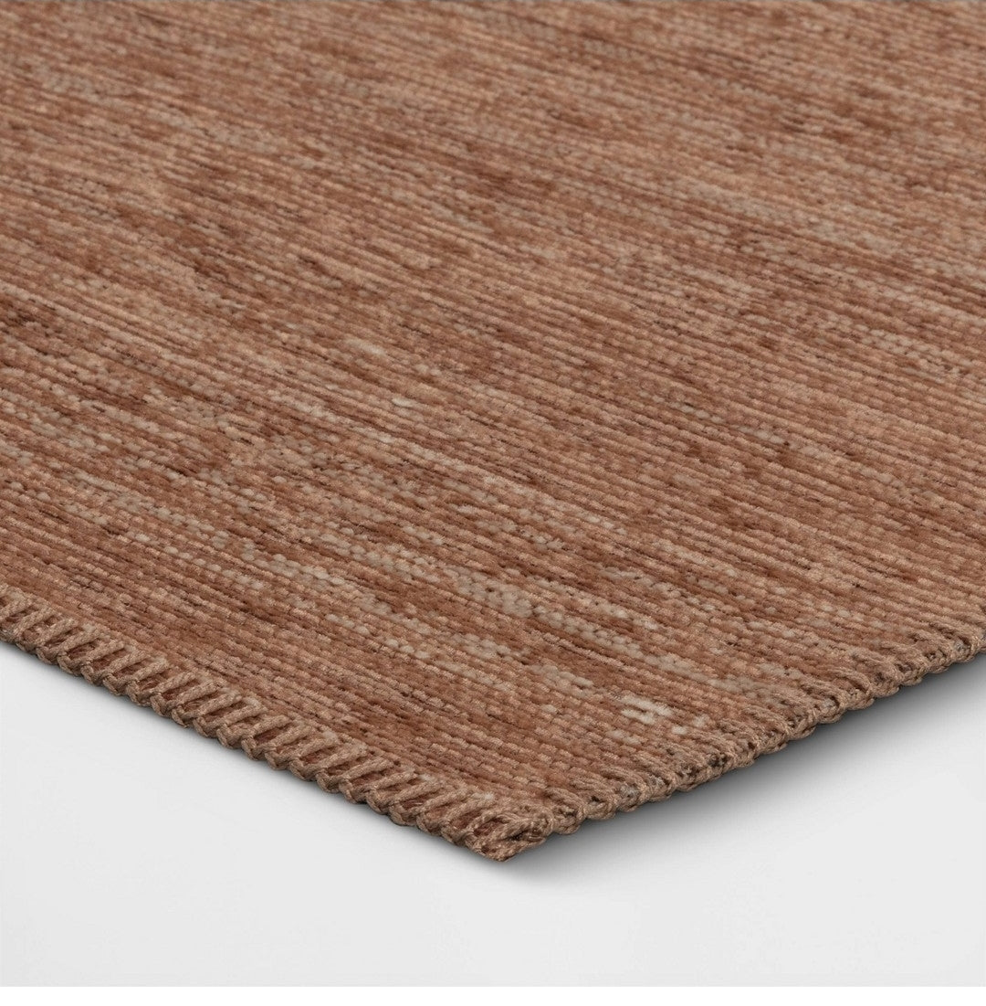 5'3 x 7 Rectangular woven outdoor/indoor rug. UV resistant  and pet friendly.